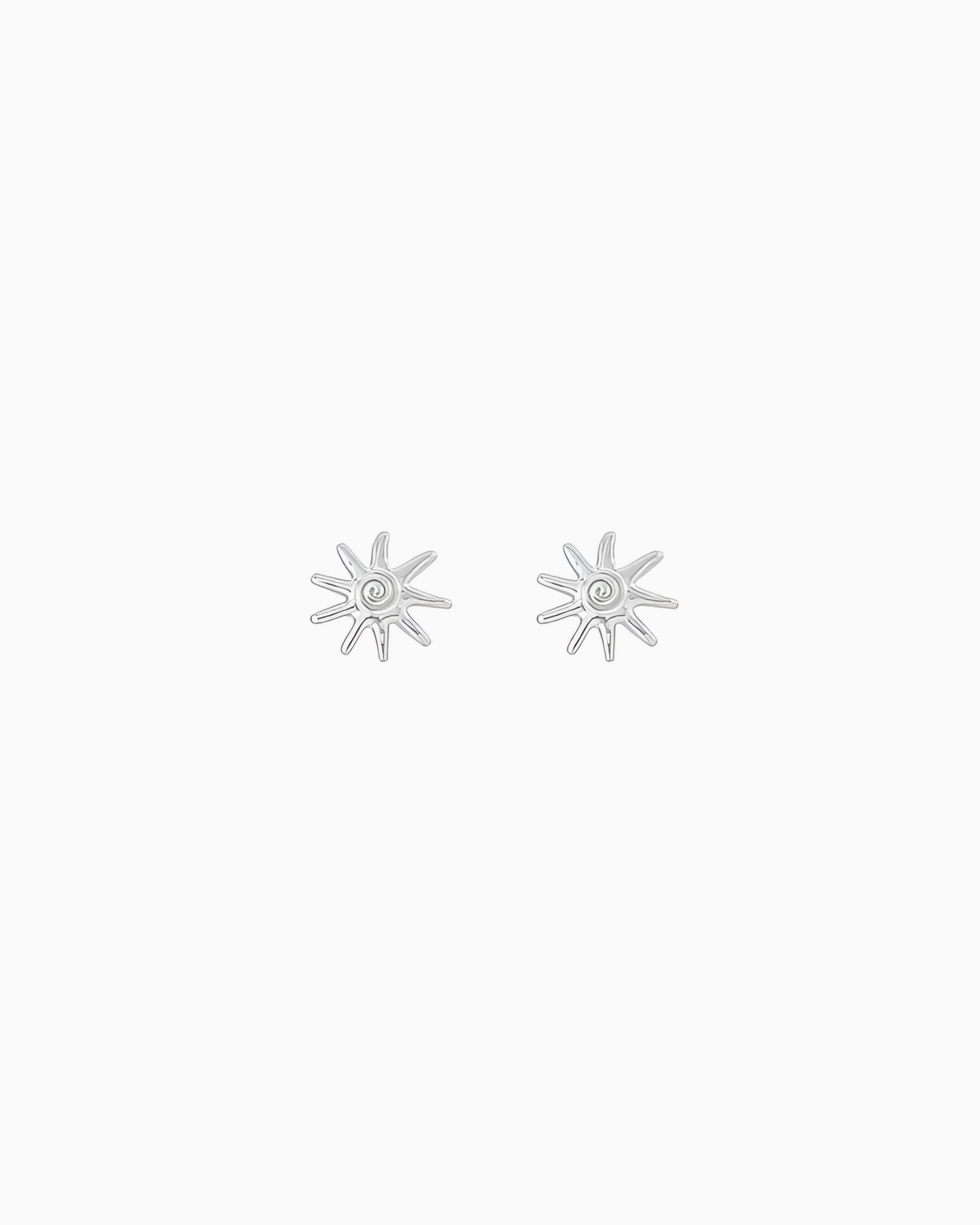 Silver sunray stud earrings with a polished finish