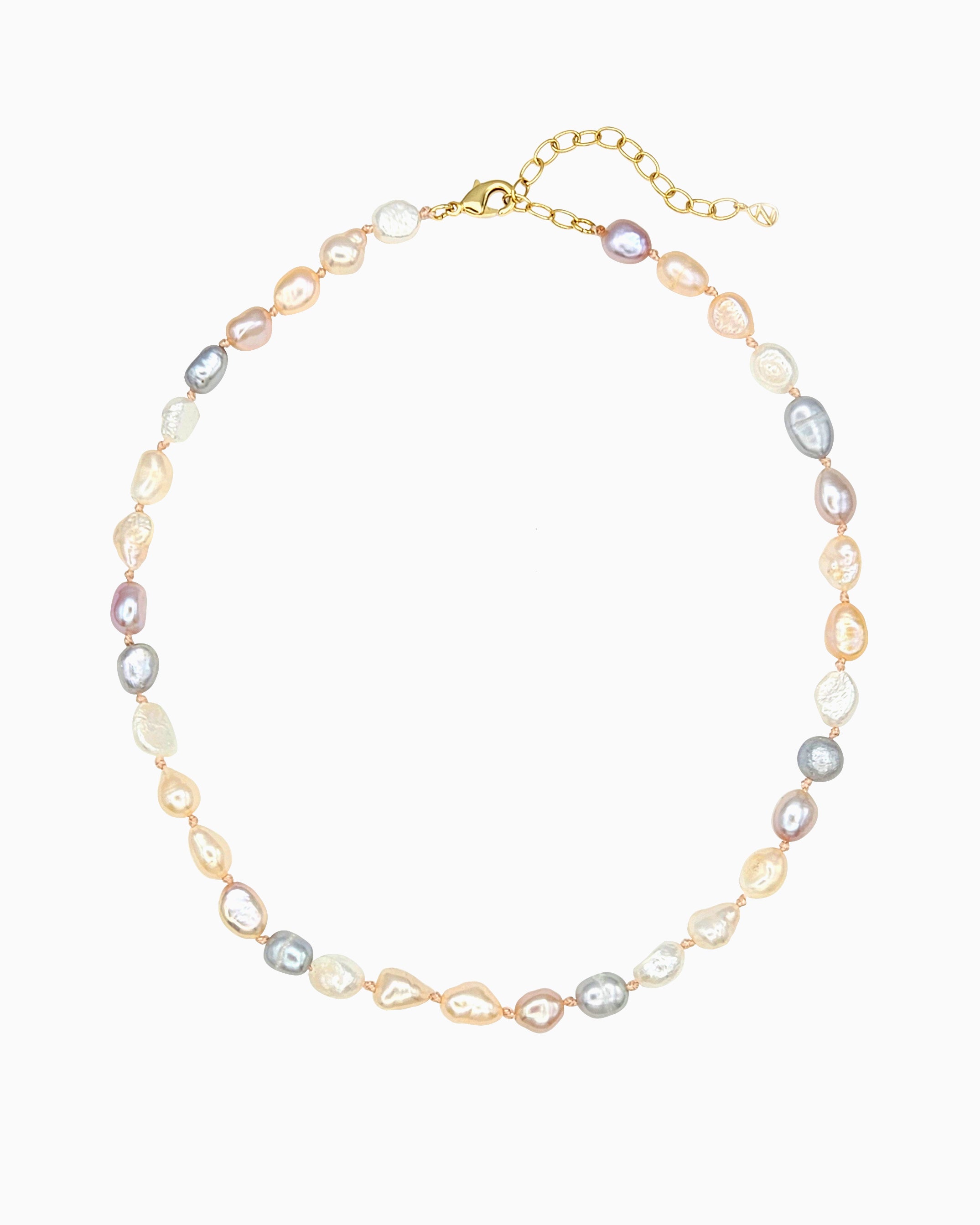 Hand-knotted freshwater pearl necklace in white, mauve, and champagne tones