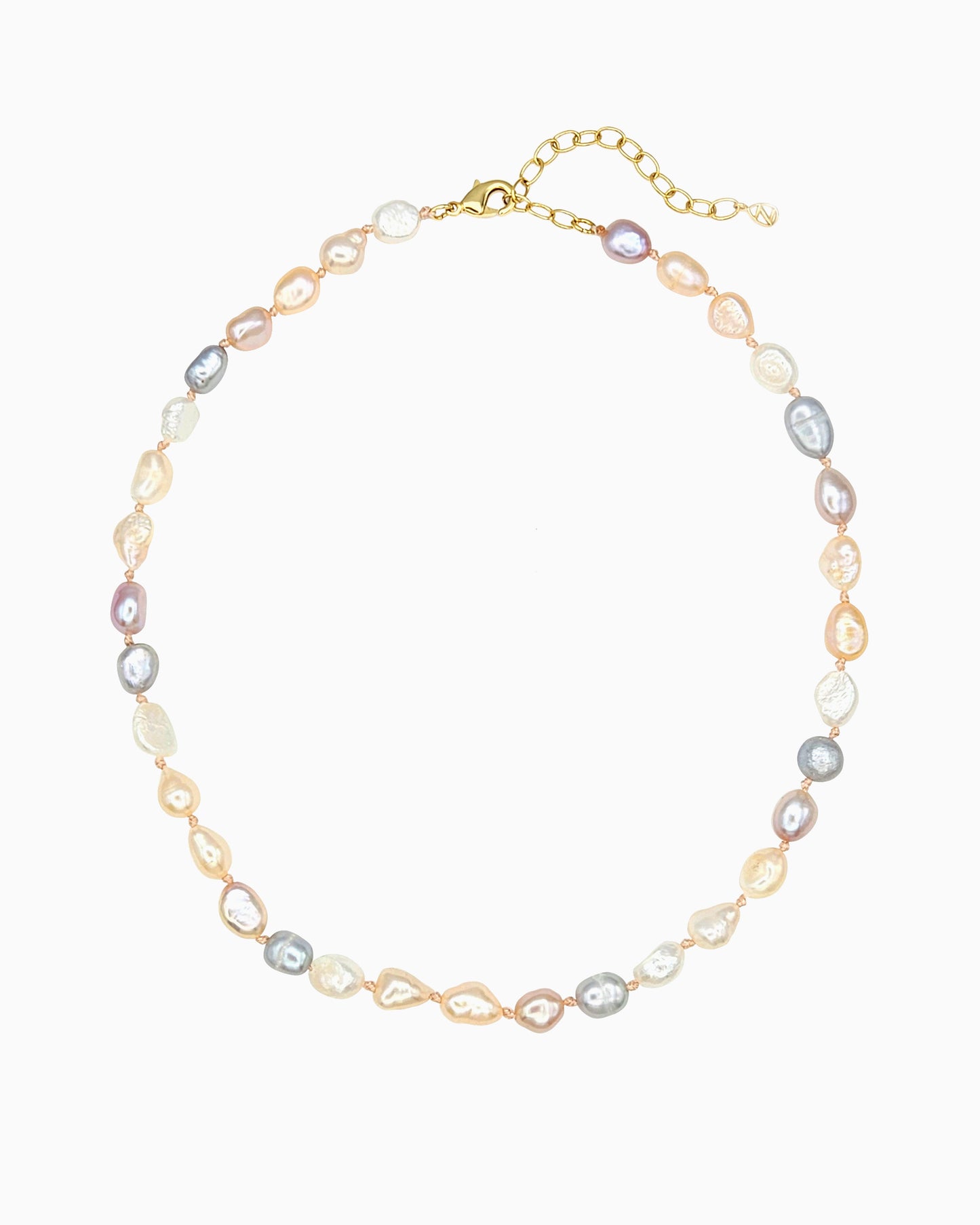 Hand-knotted freshwater pearl necklace in white, mauve, and champagne tones