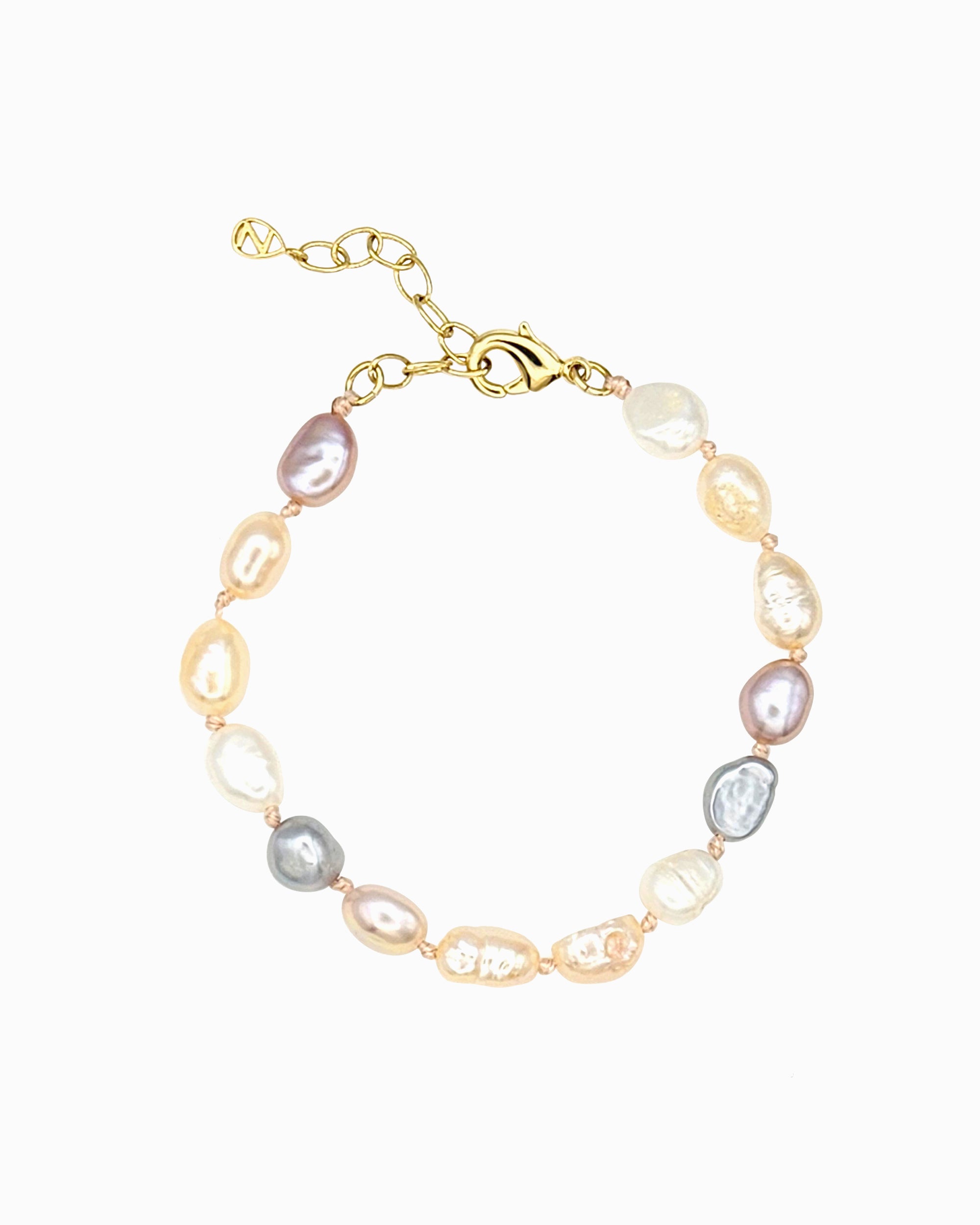 Hand-knotted freshwater pearl bracelet in white, mauve, and champagne tones