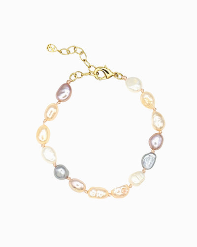 Hand-knotted freshwater pearl bracelet in white, mauve, and champagne tones