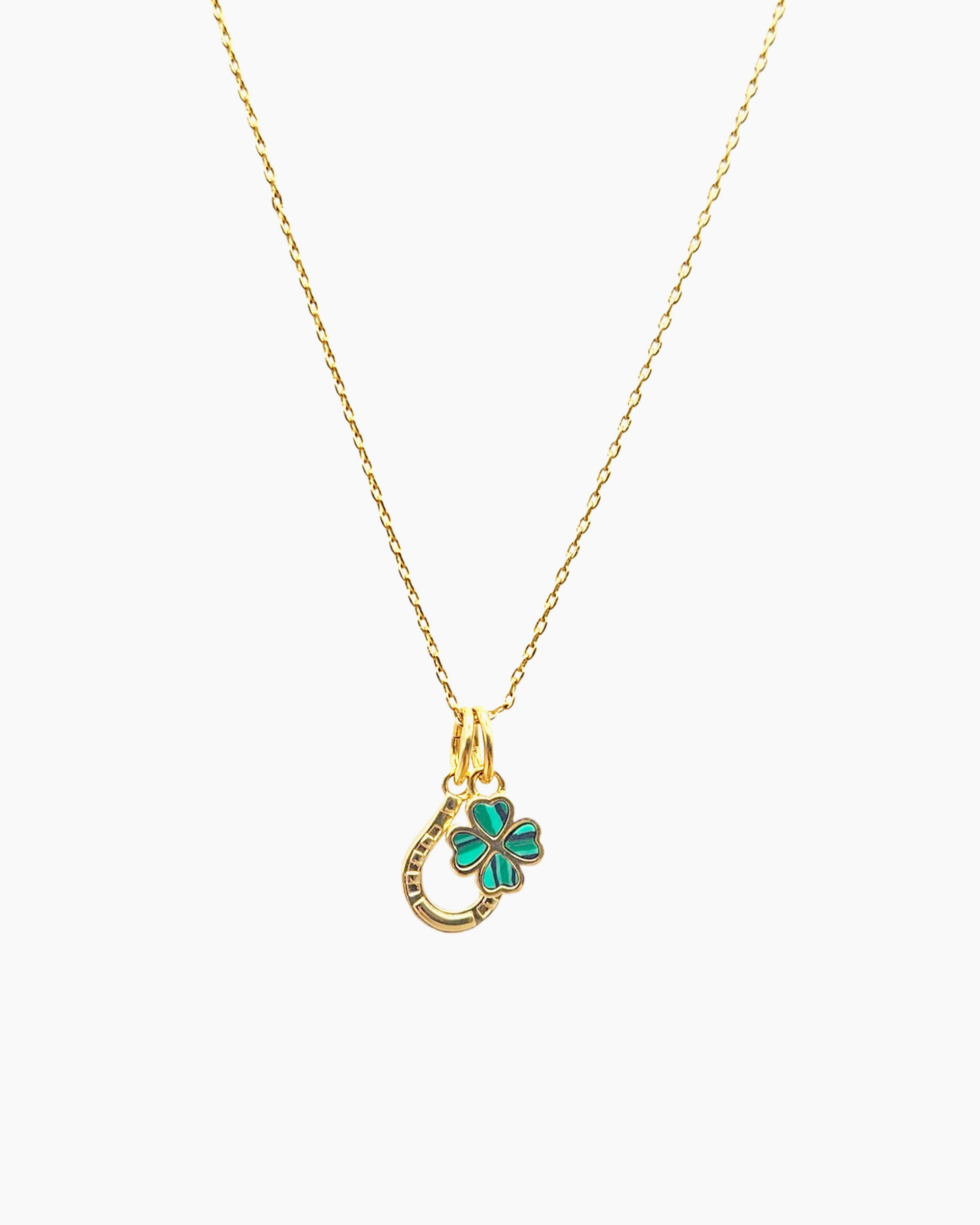 gold pvd plated horseshoe & clover charm necklace