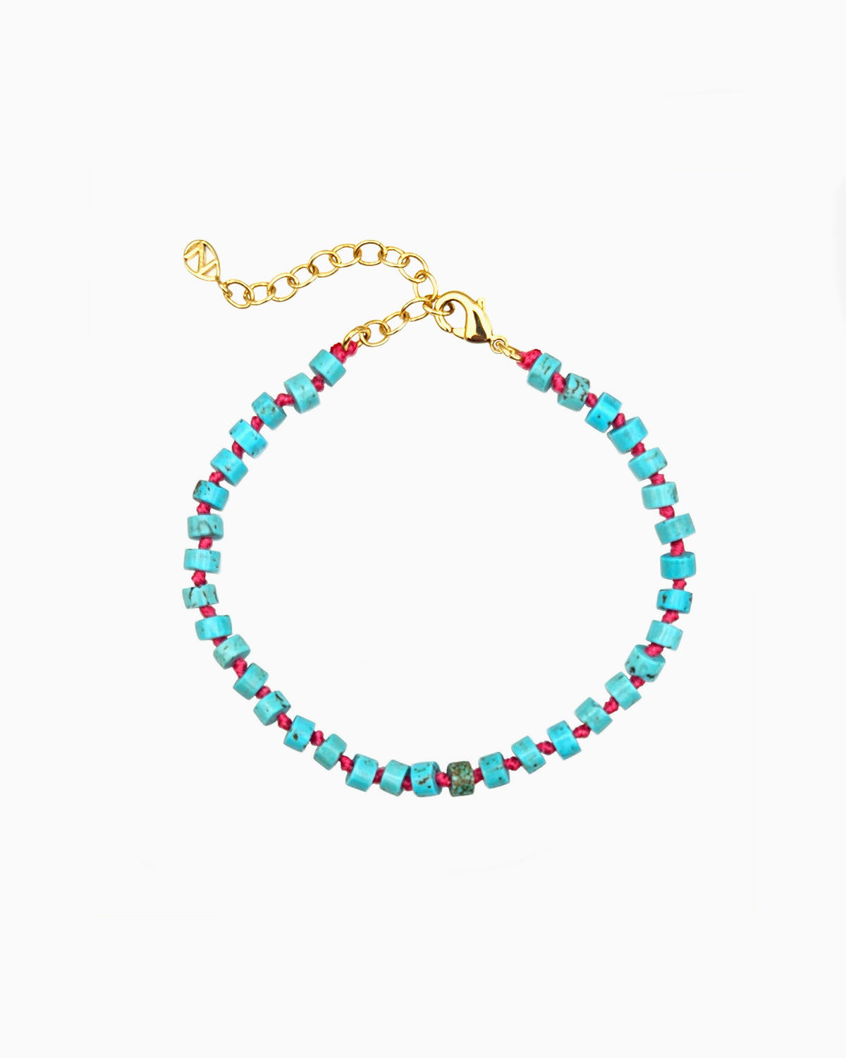 gold pvd plated hand-knotted turquoise beaded bracelet using pink thread