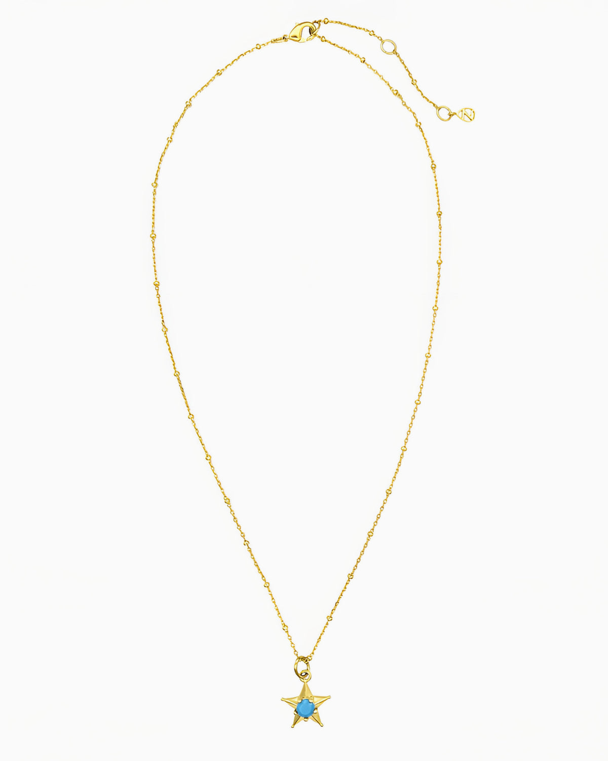 gold pvd plated star charm necklace with turquoise cz