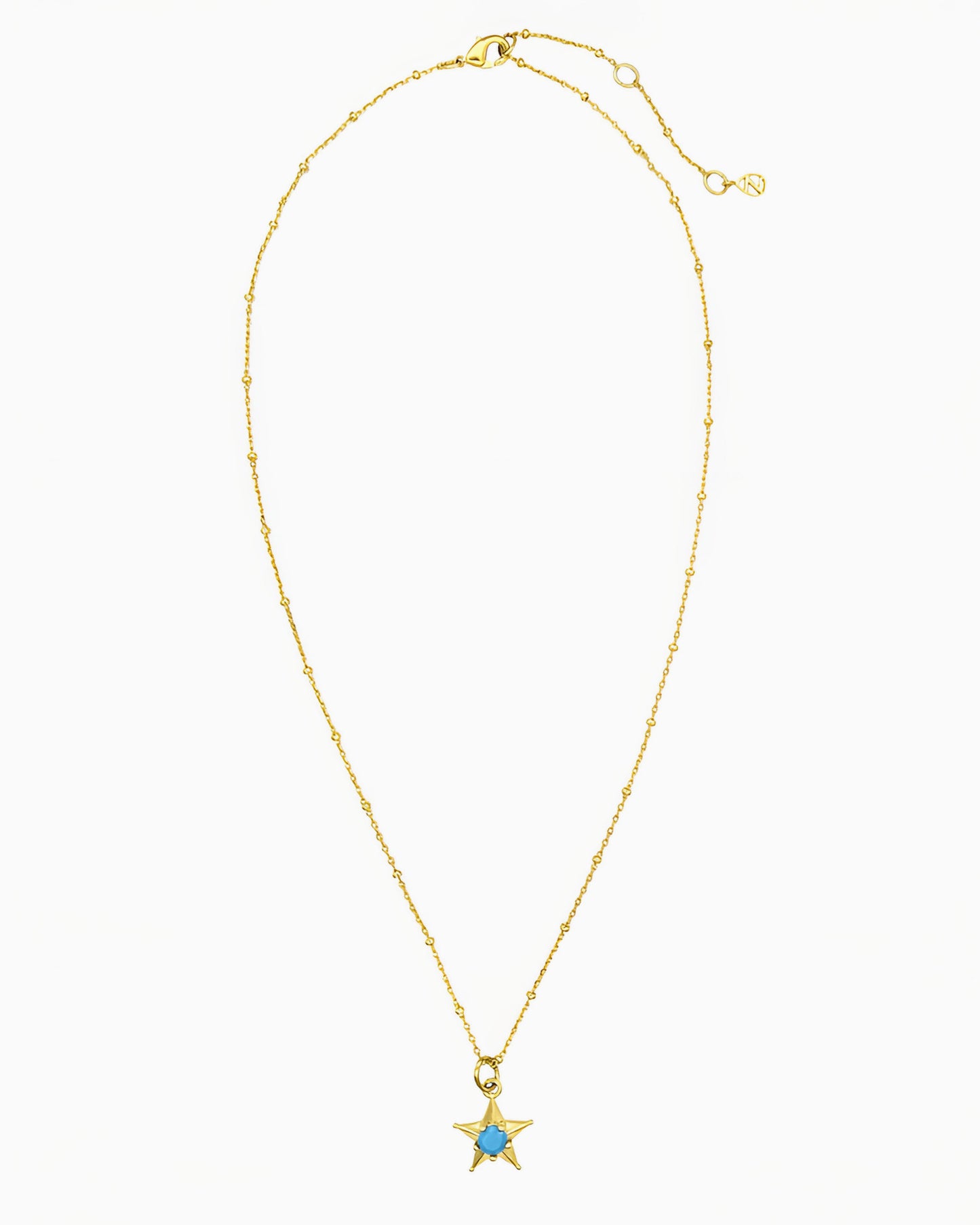 gold pvd plated star charm necklace with turquoise cz