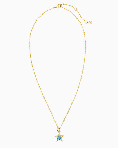 gold pvd plated star charm necklace with turquoise cz