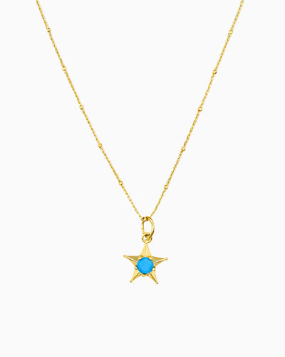 gold pvd plated star charm necklace with turquoise cz