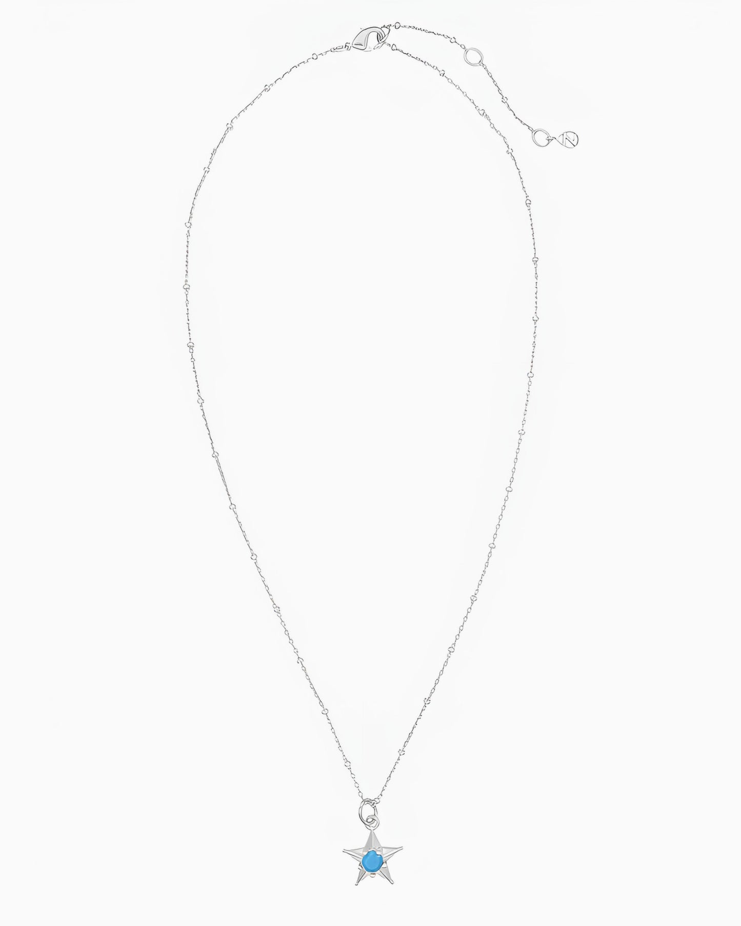silver pvd plated star charm necklace with turquoise cz