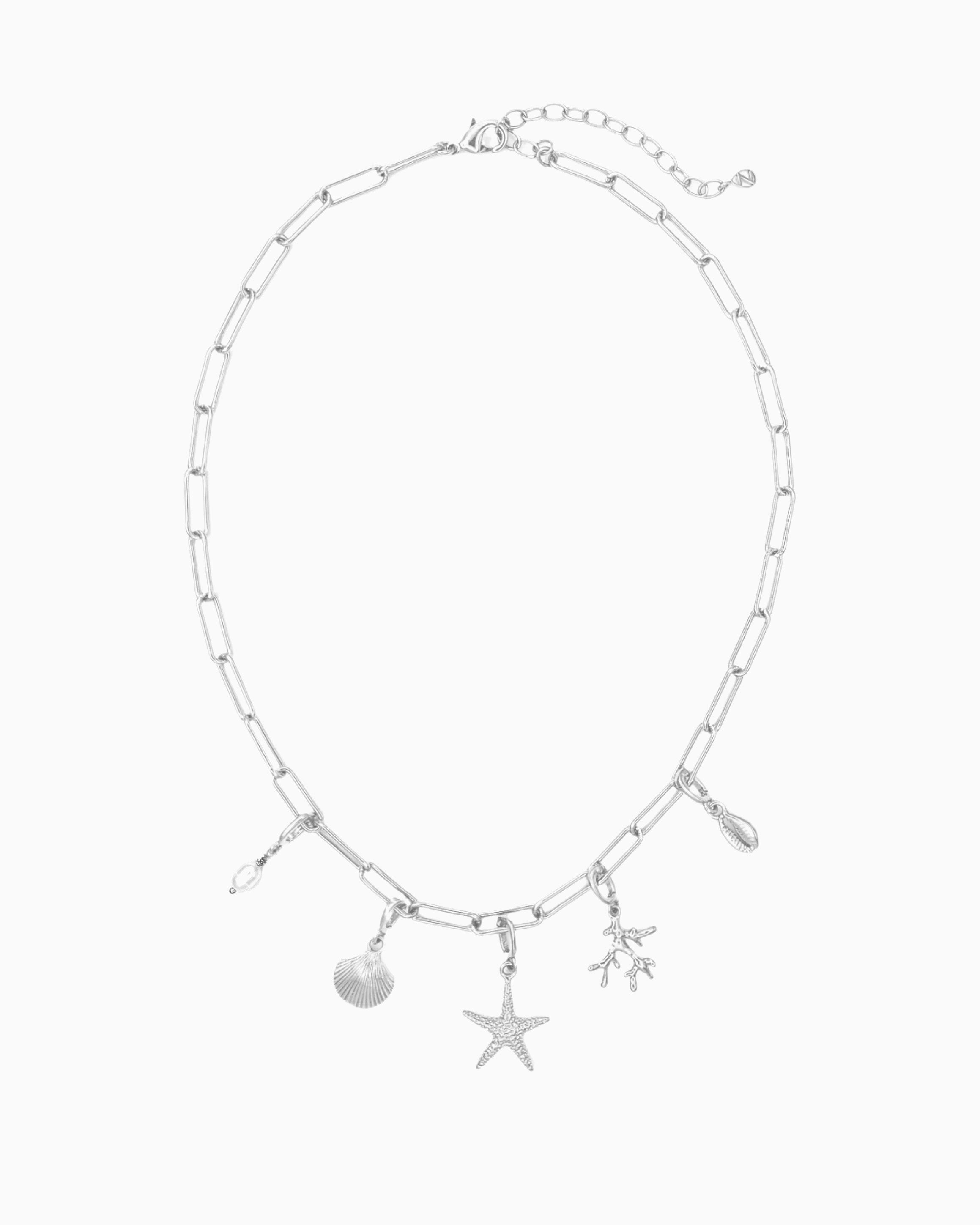 Seaside Charm Necklace with removable cowrie shell, coral branch, starfish, seashell, and  freshwater pearl clip-on charms on a silver paperclip chain