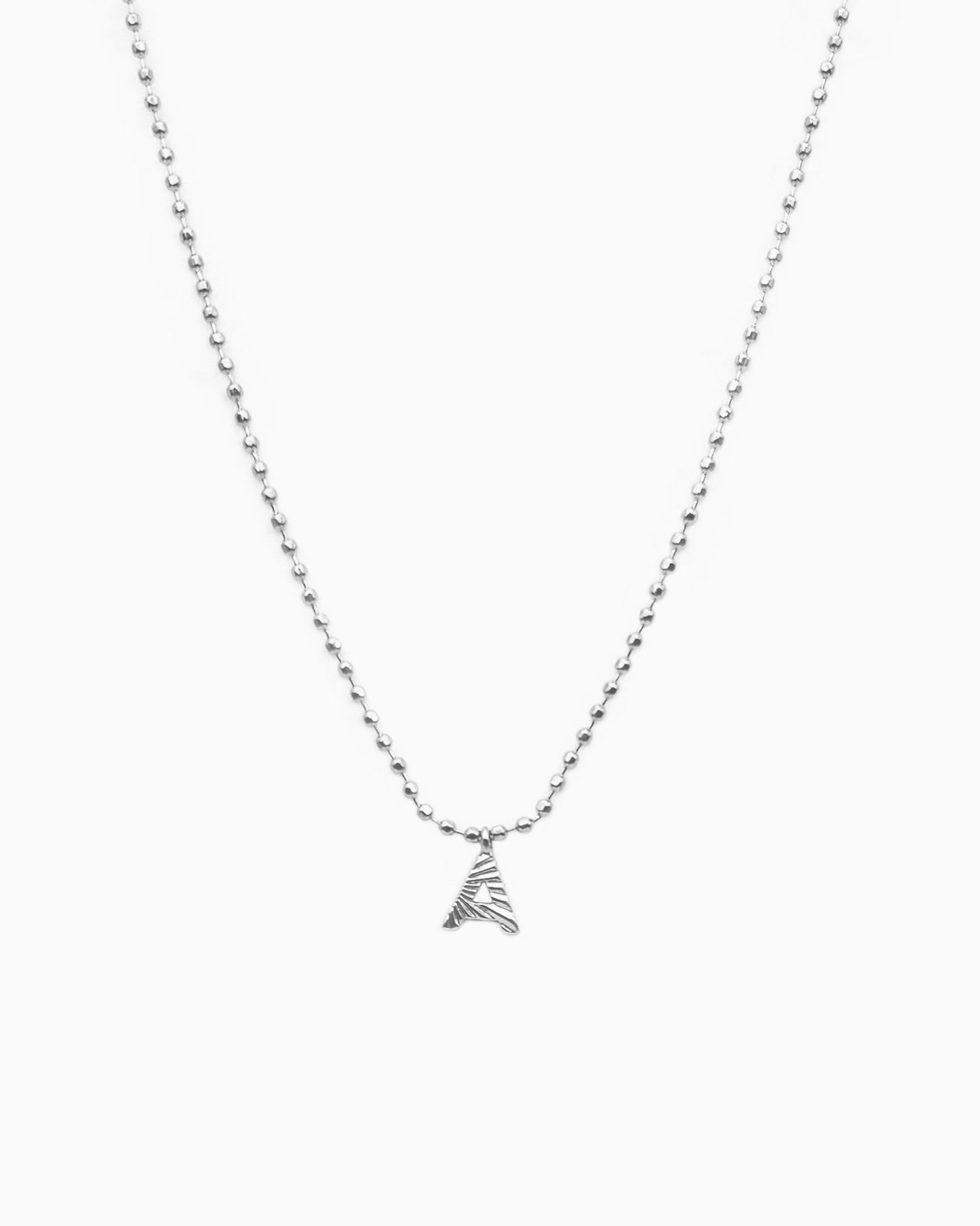 TINY INITIAL CHARM NECKLACE