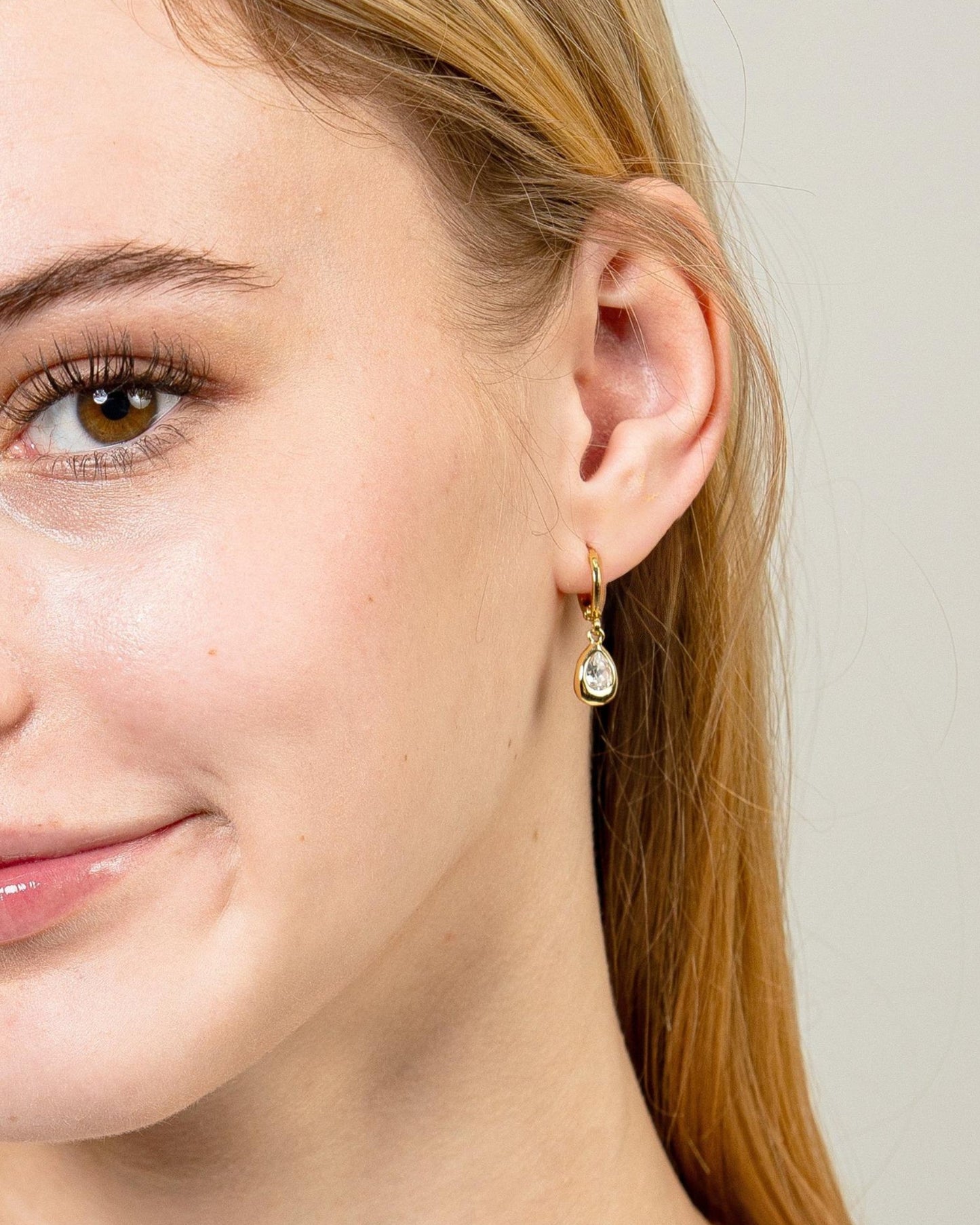 MOLTEN TEARDROP CRYSTAL HUGGIE EARRINGS