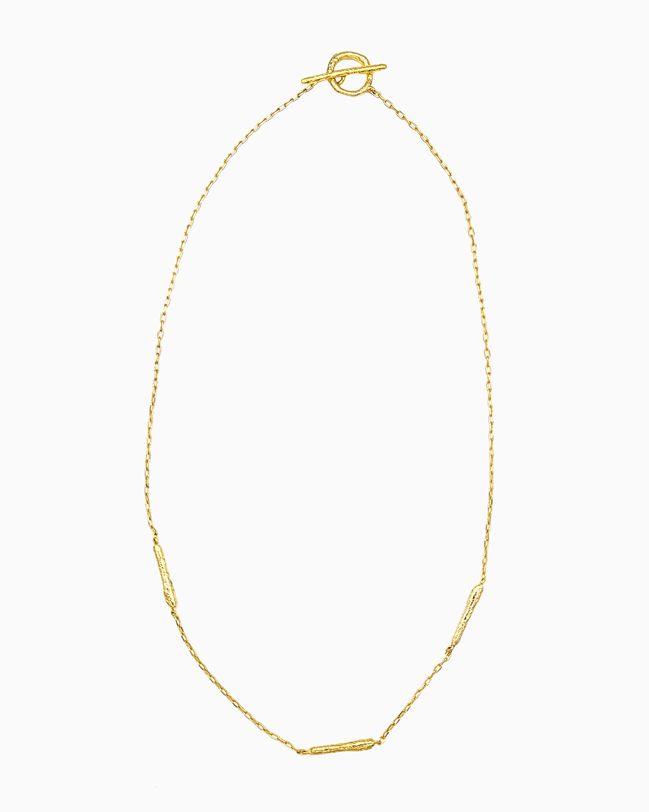 oft erosion bar necklace with front toggle clasp in gold finish