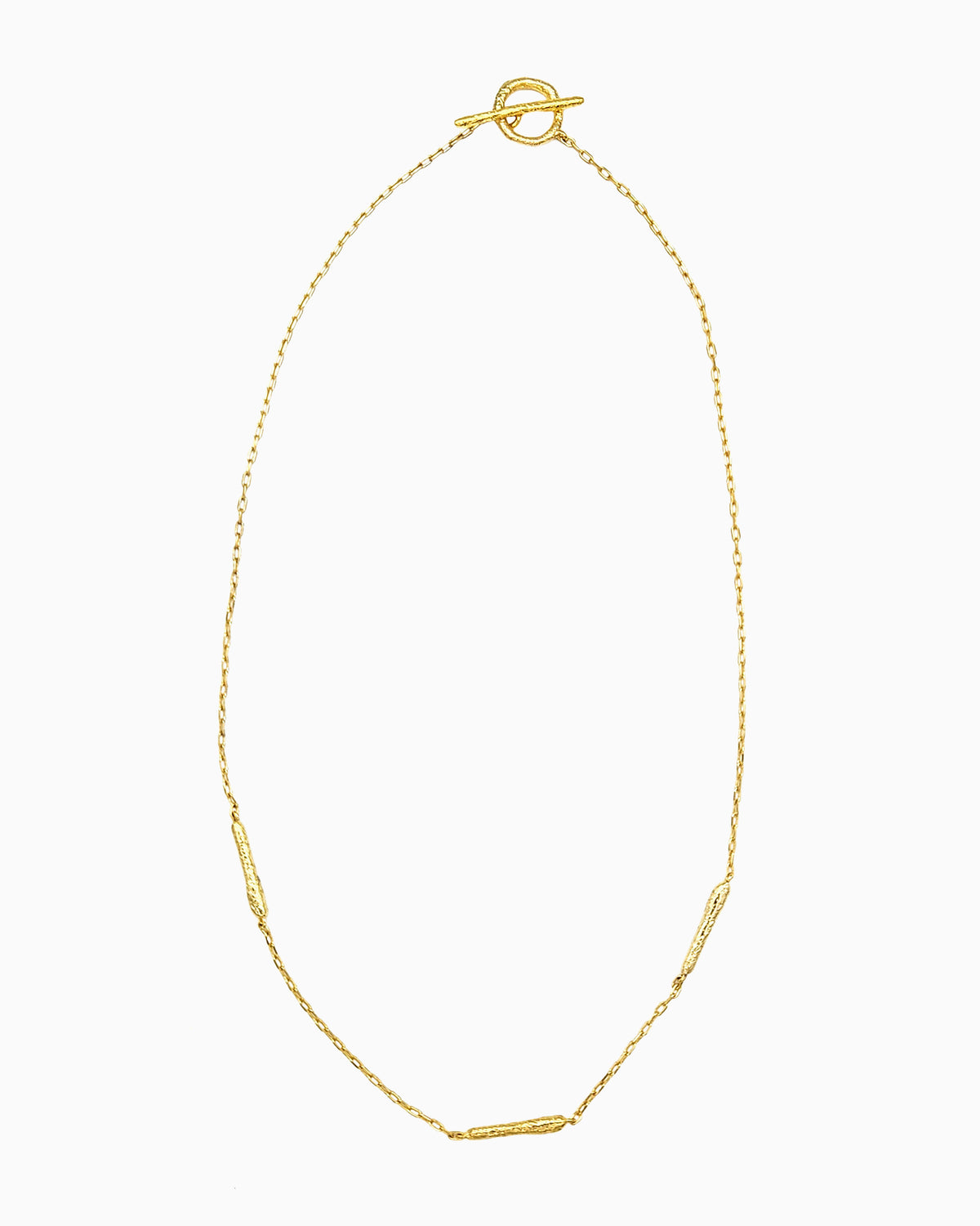 oft erosion bar necklace with front toggle clasp in gold finish