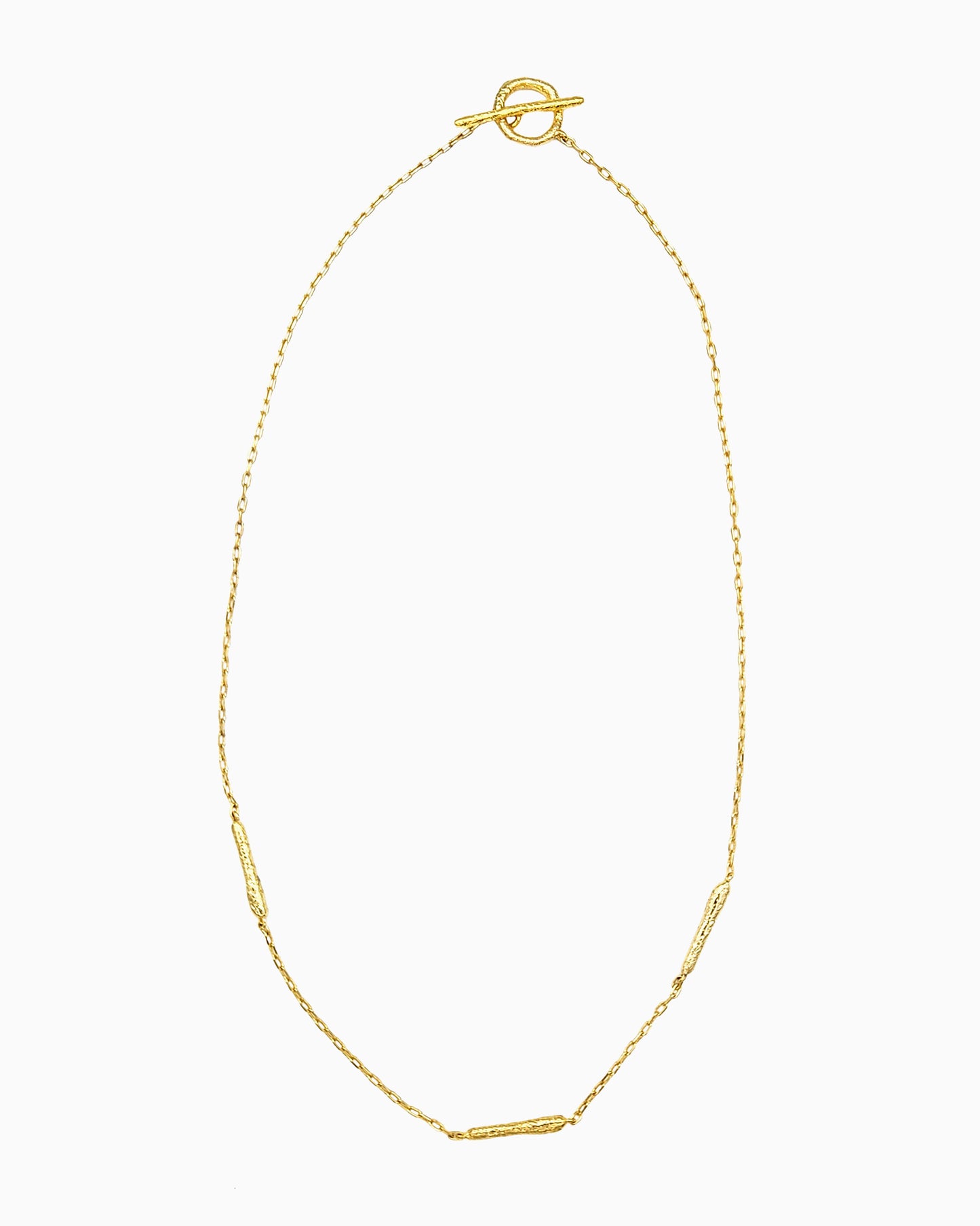 oft erosion bar necklace with front toggle clasp in gold finish