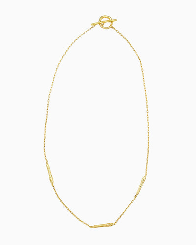 oft erosion bar necklace with front toggle clasp in gold finish
