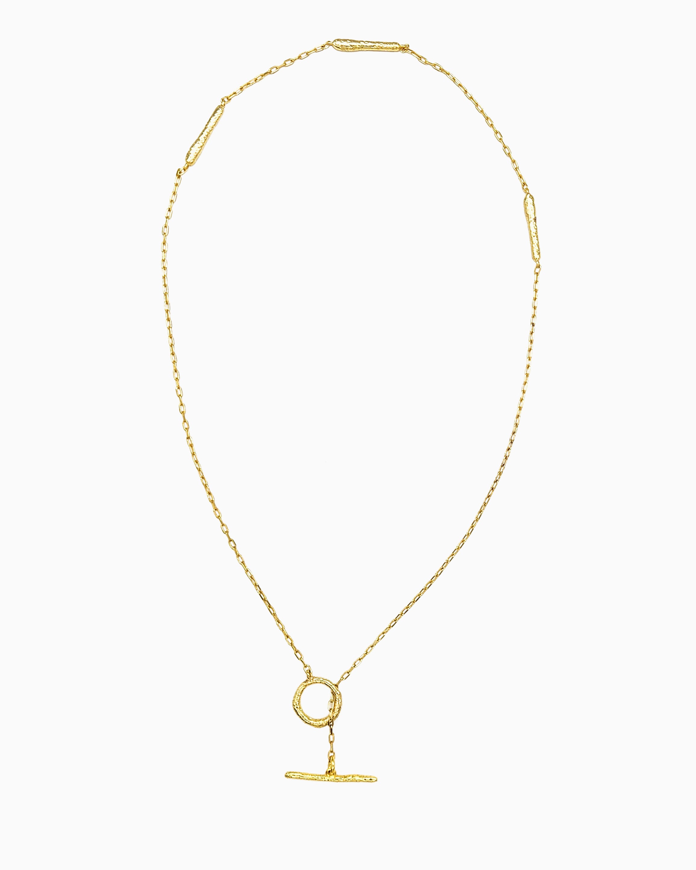 oft erosion bar necklace with front toggle clasp in gold finish