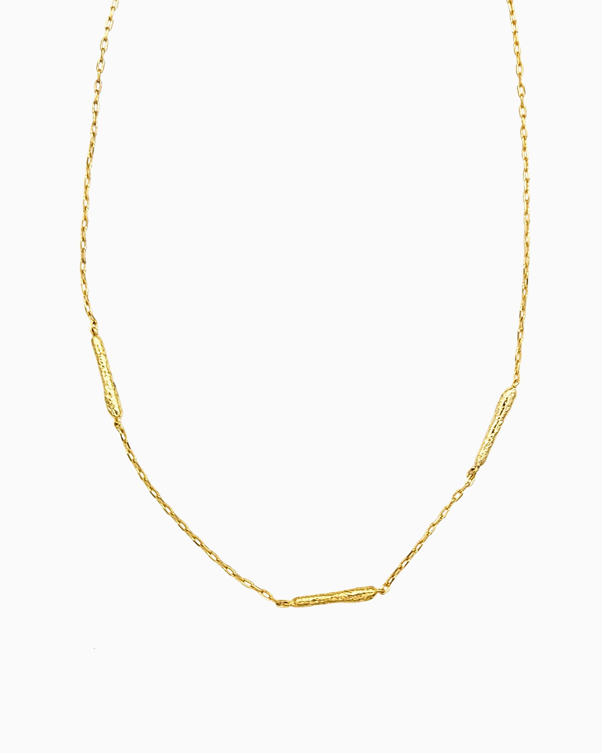 oft erosion bar necklace with front toggle clasp in gold finish