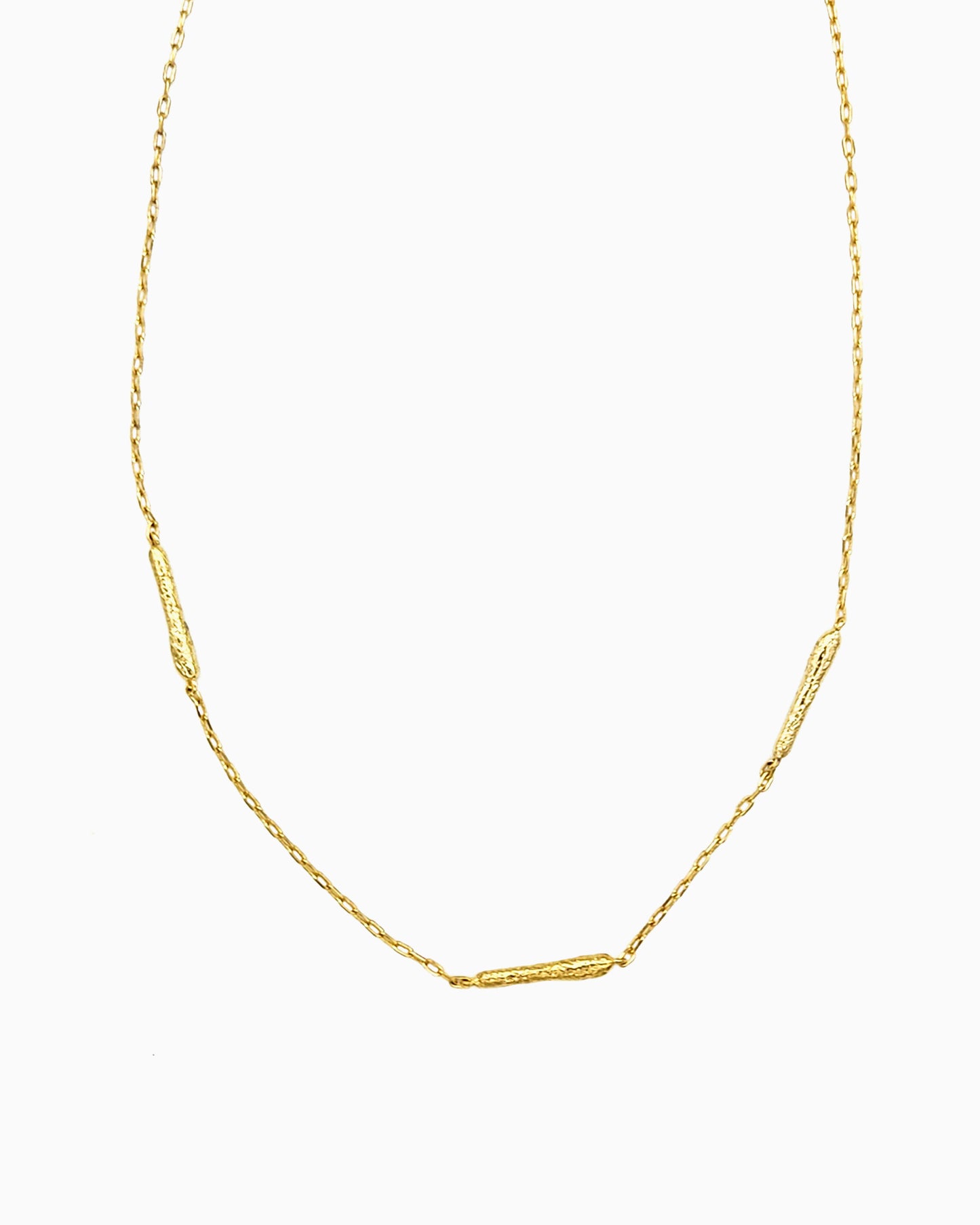 oft erosion bar necklace with front toggle clasp in gold finish