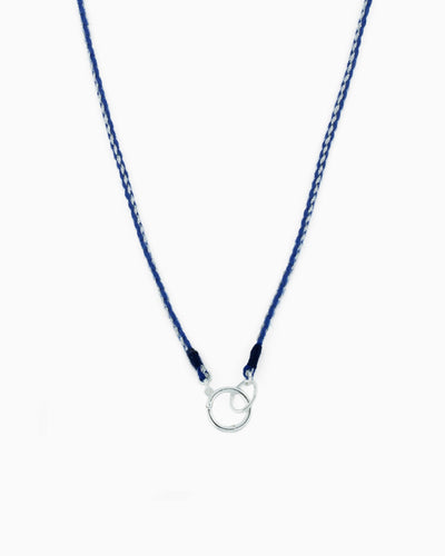 Hand-braided green cord necklace with a silver charm holder ring, designed to be worn alone or personalized with ZoHaYo Clip-On Charms.