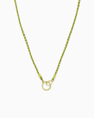 Hand-braided green cord necklace with a gold charm holder ring, designed to be worn alone or personalized with ZoHaYo Clip-On Charms.