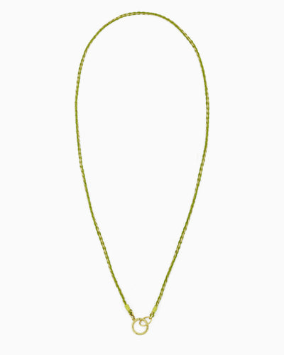 Hand-braided green cord necklace with a gold charm holder ring, designed to be worn alone or personalized with ZoHaYo Clip-On Charms.