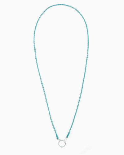 Hand-braided green cord necklace with a silver charm holder ring, designed to be worn alone or personalized with ZoHaYo Clip-On Charms.