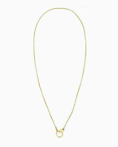 Hand-braided green cord necklace with a gold charm holder ring, designed to be worn alone or personalized with ZoHaYo Clip-On Charms.