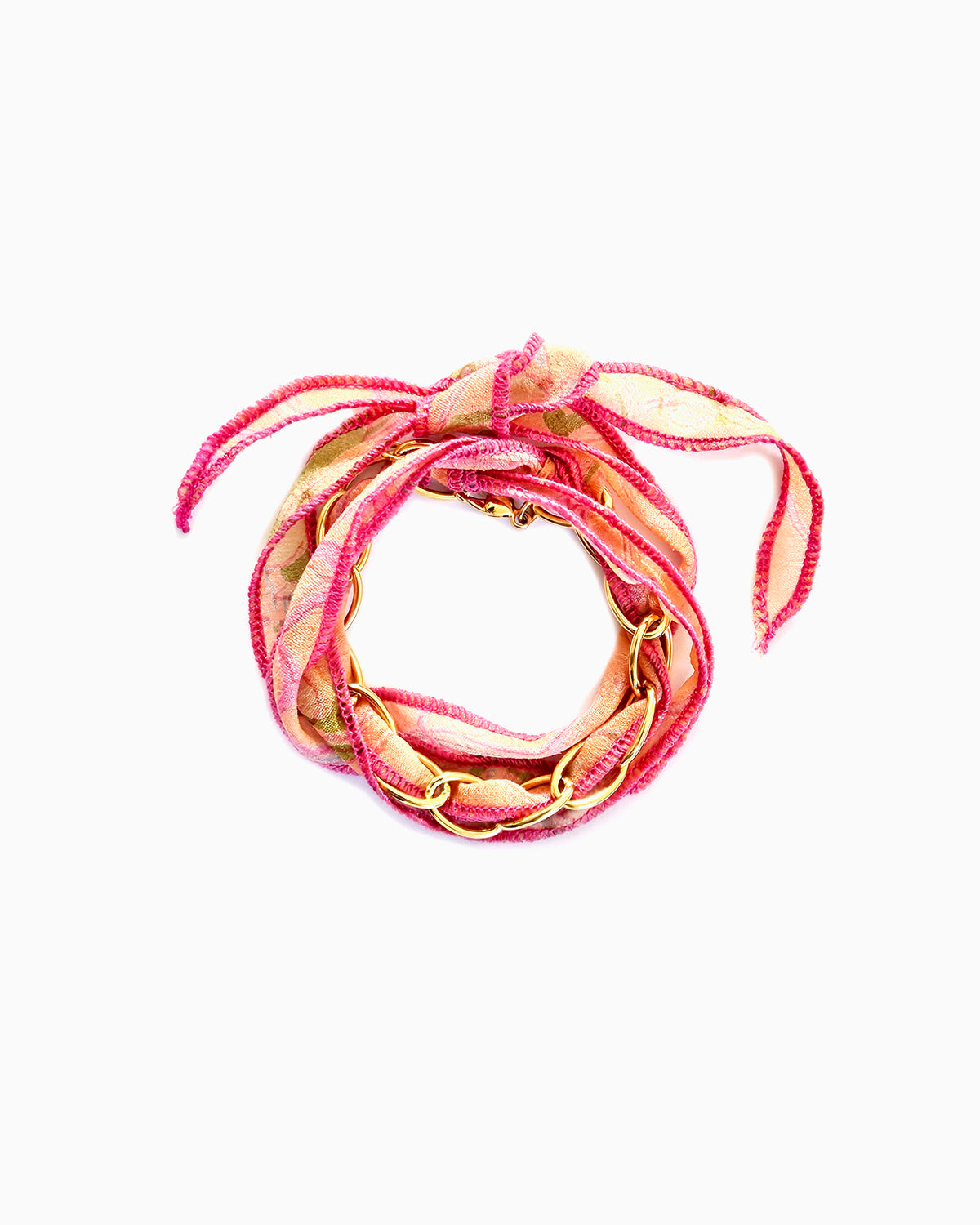 Pink Zest silk ribbon chain bracelet with pink, apricot & green patterned ribbon and hot pink stitching