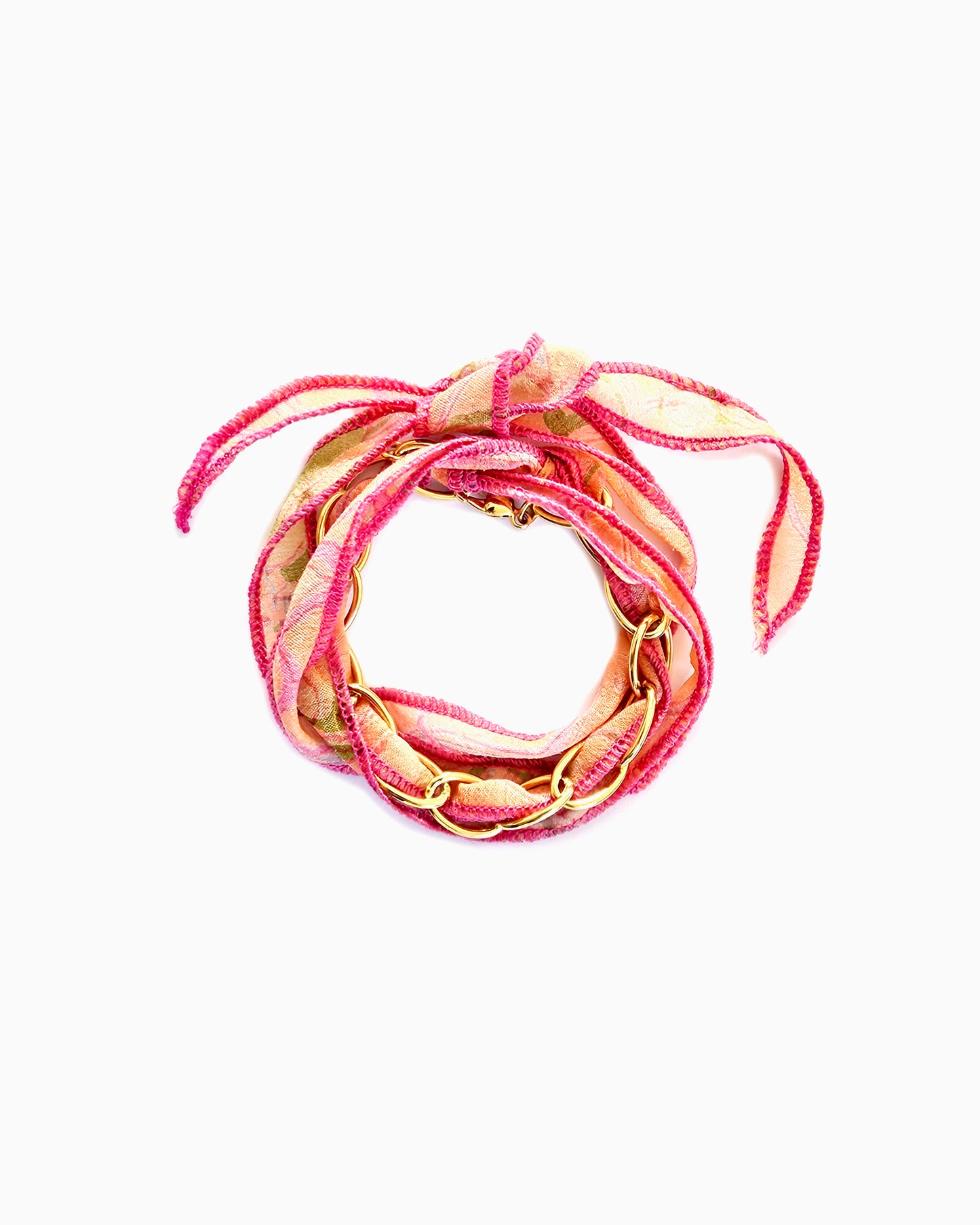 Pink Zest silk ribbon chain bracelet with pink, apricot & green patterned ribbon and hot pink stitching