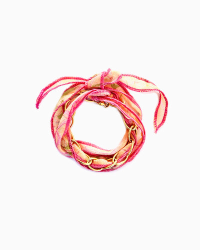 Pink Zest silk ribbon chain bracelet with pink, apricot & green patterned ribbon and hot pink stitching