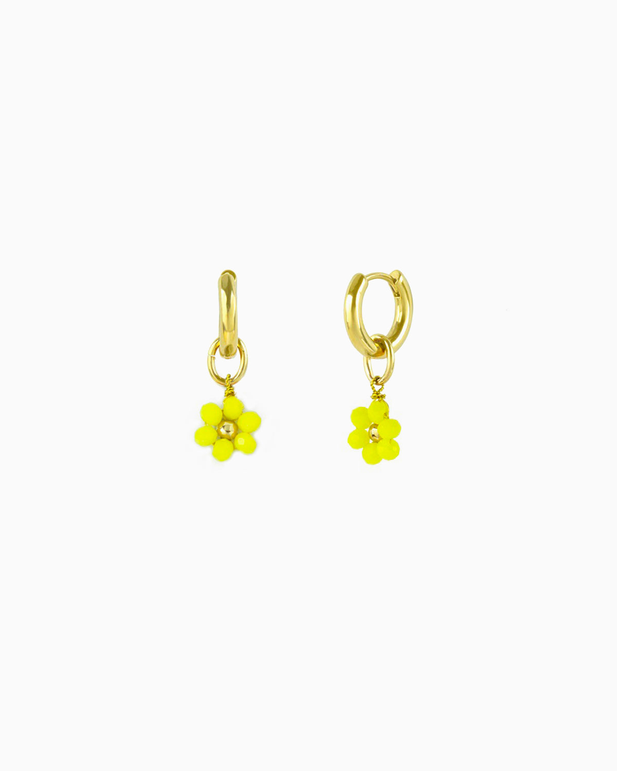 Gold huggie earrings with interchangeable yellow glass beaded flower charm.