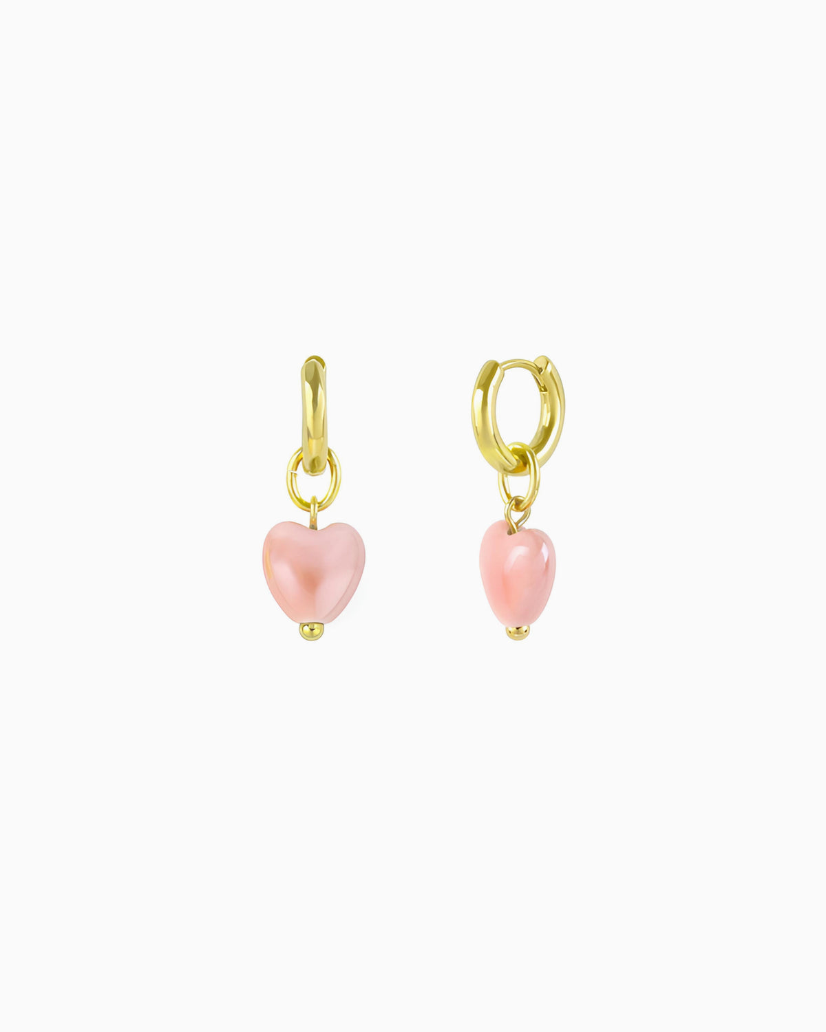 Gold huggie earrings with interchangeable pink ceramic heart charms