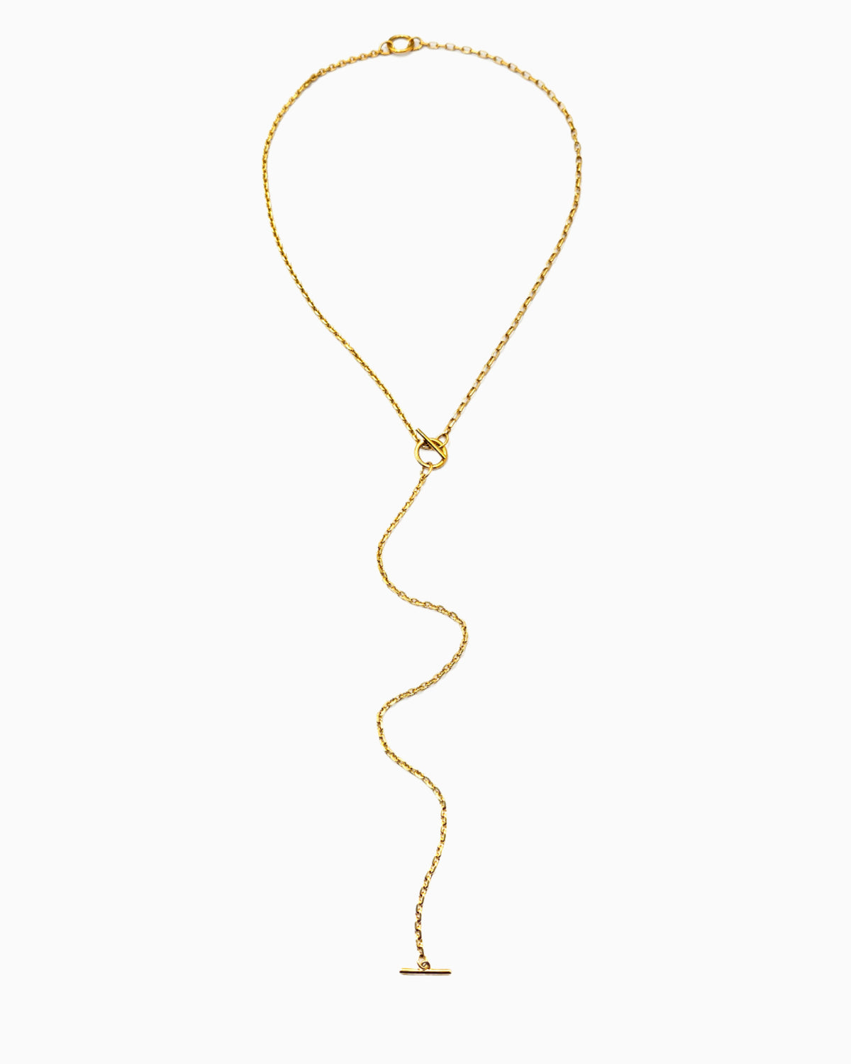 Dual toggle gold chain necklace styled as a lariat and layered two-row necklace