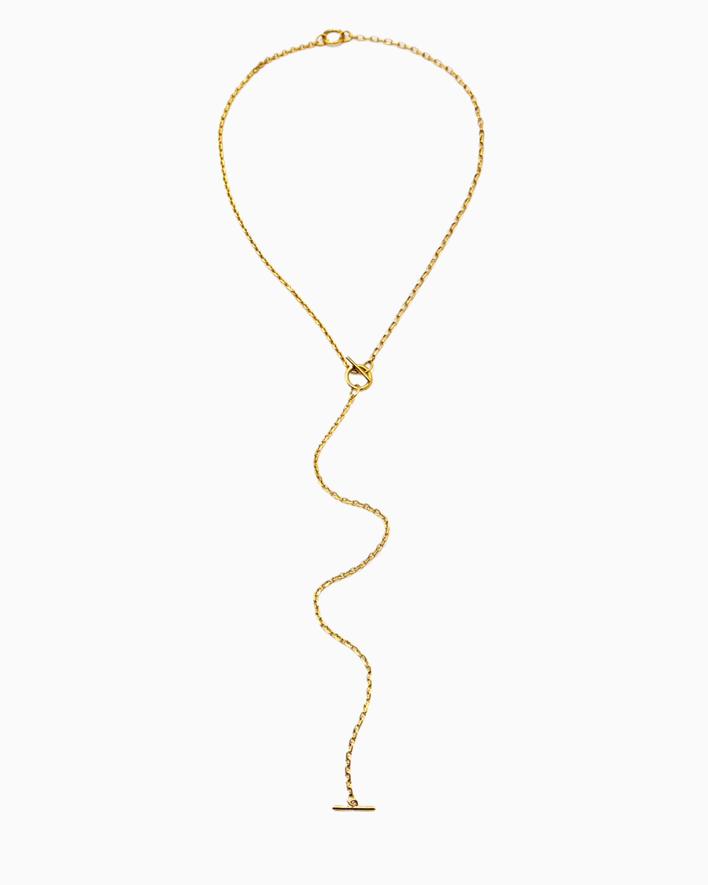 Dual toggle gold chain necklace styled as a lariat and layered two-row necklace