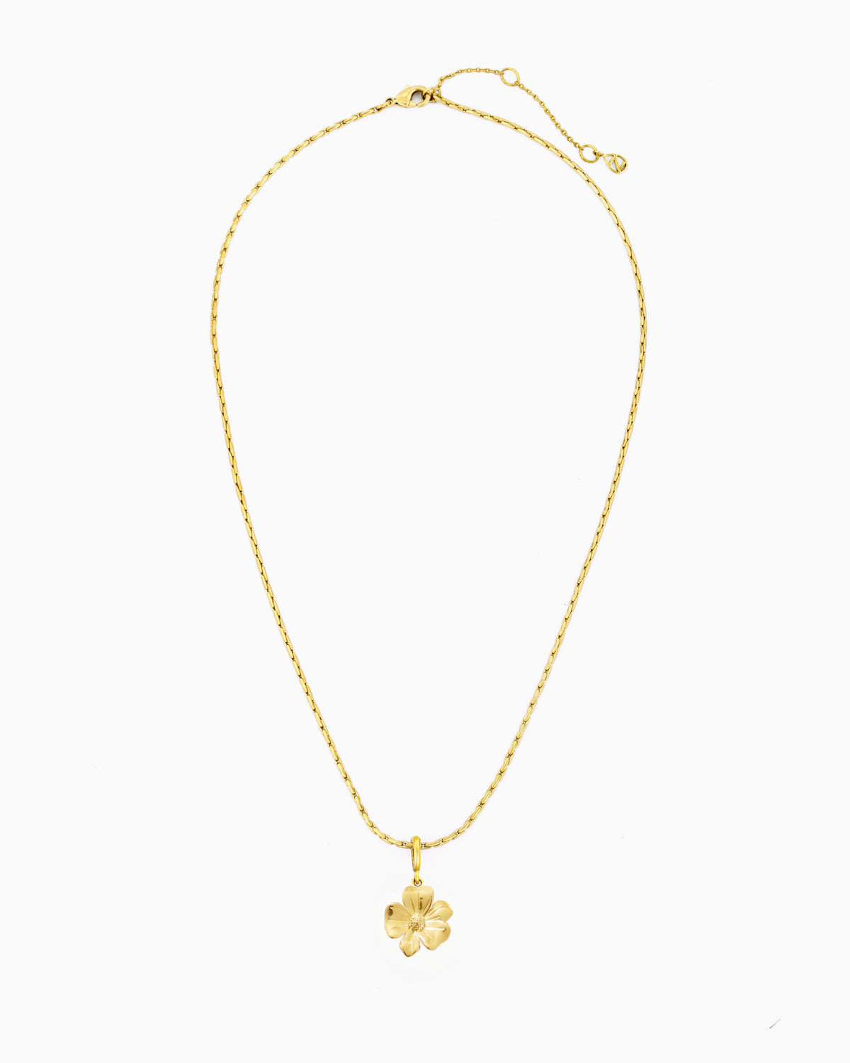 gold flower charm necklace with clip-on charm on delicate chain