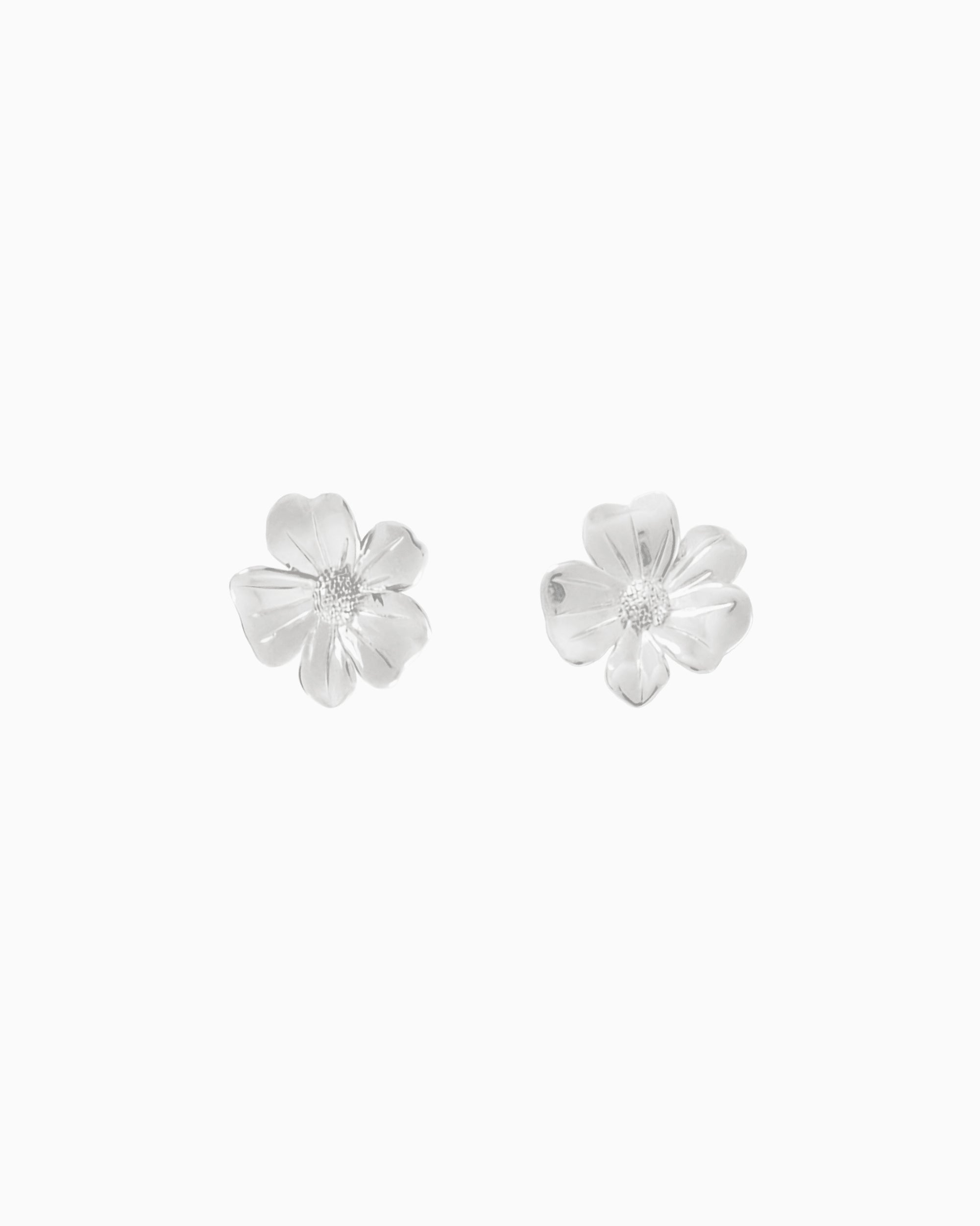 silver flower stud earrings with sculpted petal design