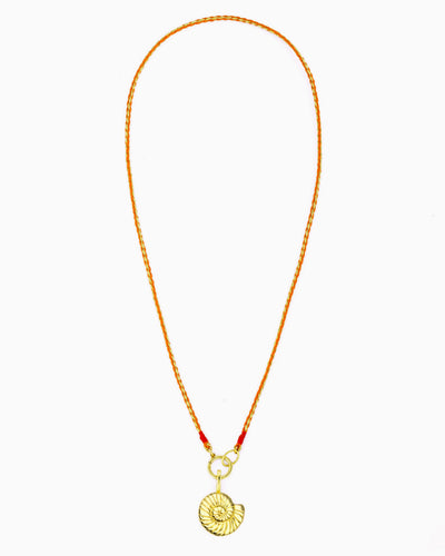 Hand-braided orange and gold cord necklace featuring a removable Nautilus Clip-On Charm.