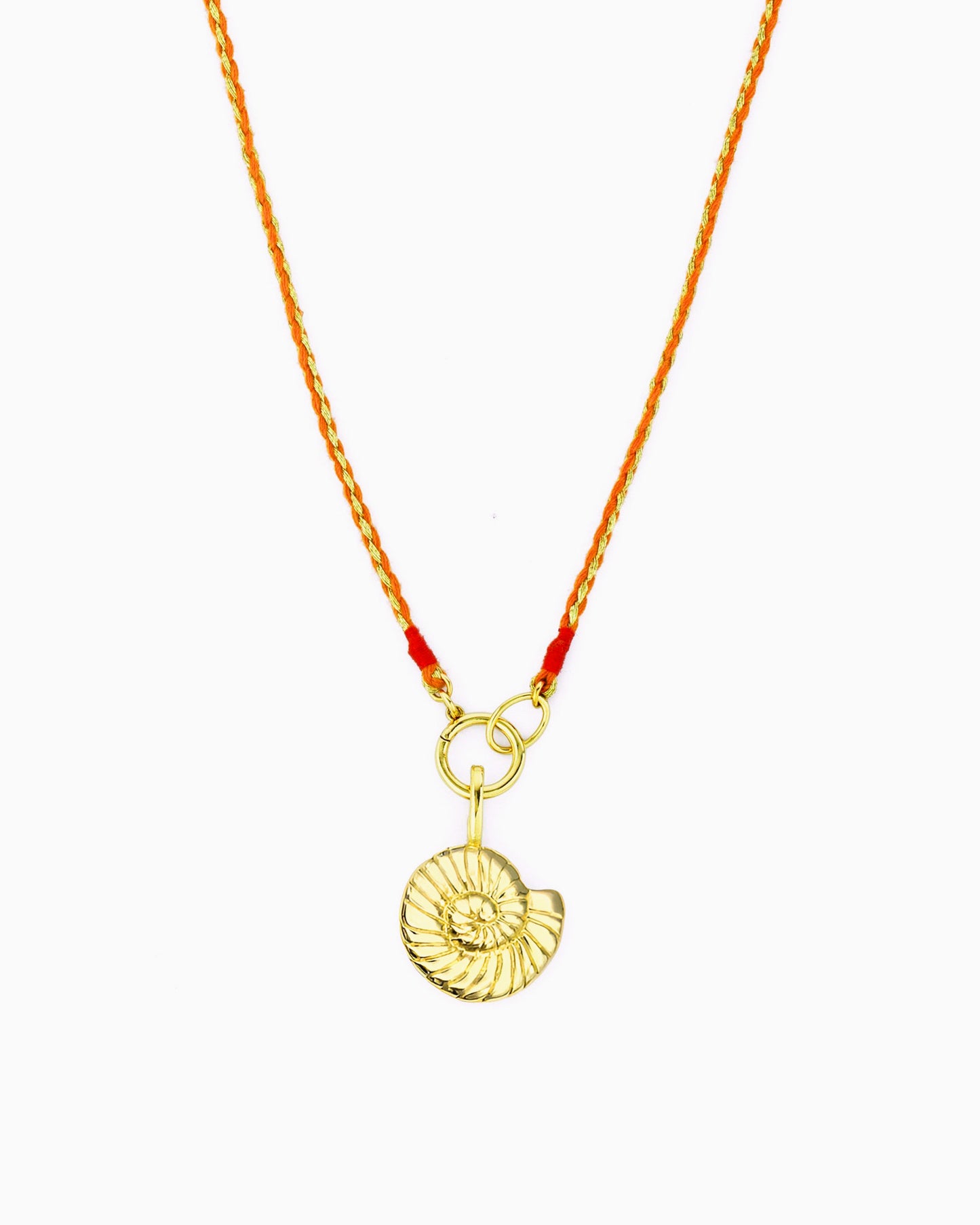 Hand-braided orange and gold cord necklace featuring a removable Nautilus Clip-On Charm.