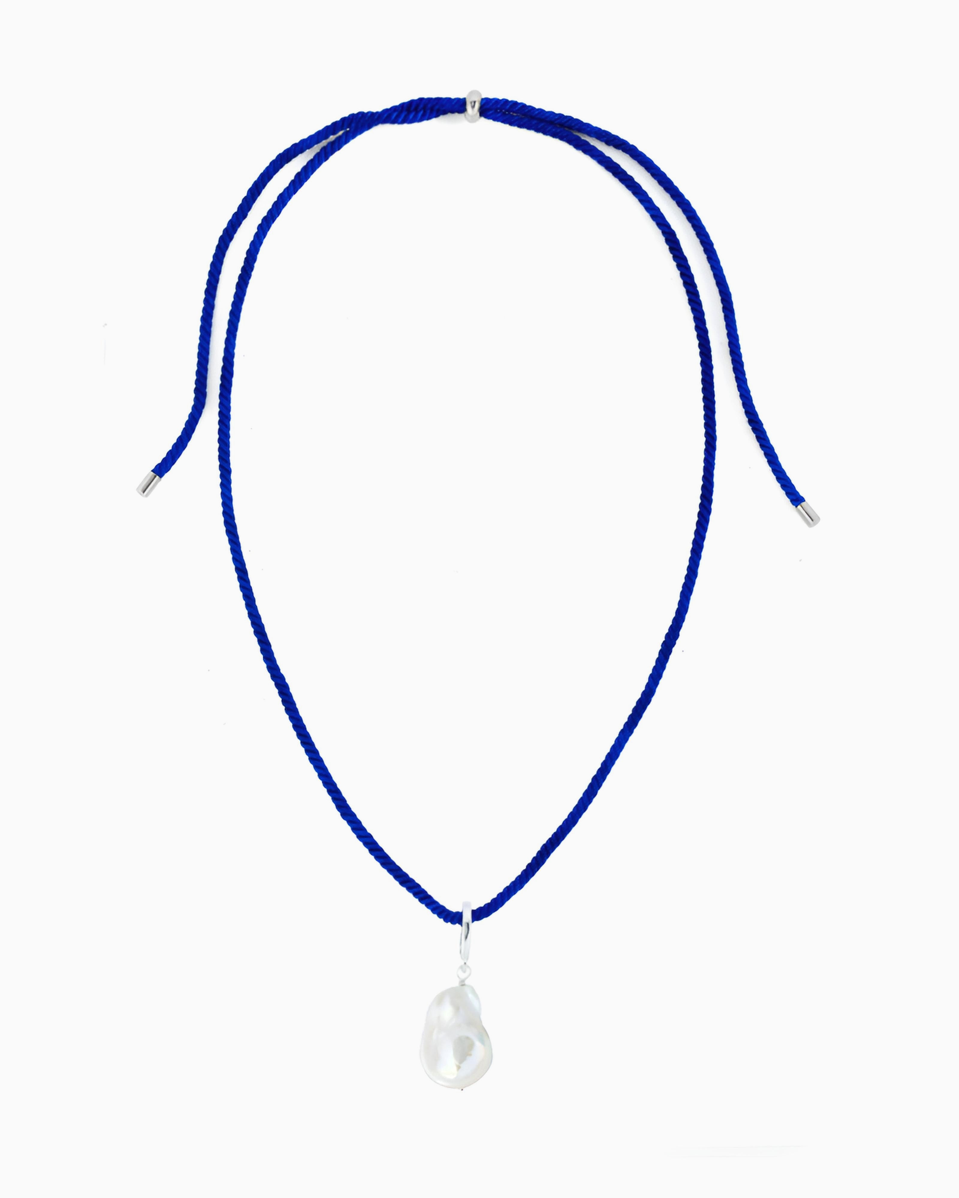 Royal blue rope cord necklace featuring a detachable baroque freshwater pearl pendant and silver-tone accents
