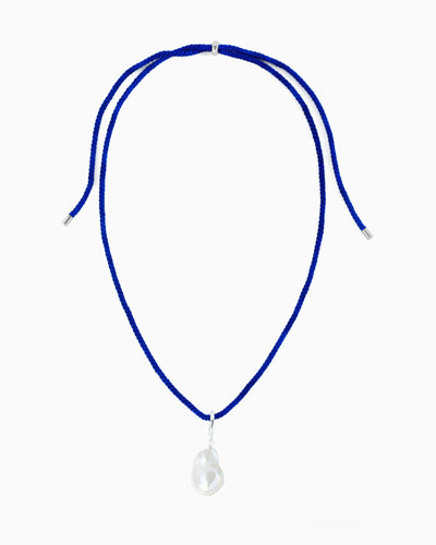 Royal blue rope cord necklace featuring a detachable baroque freshwater pearl pendant and silver-tone accents
