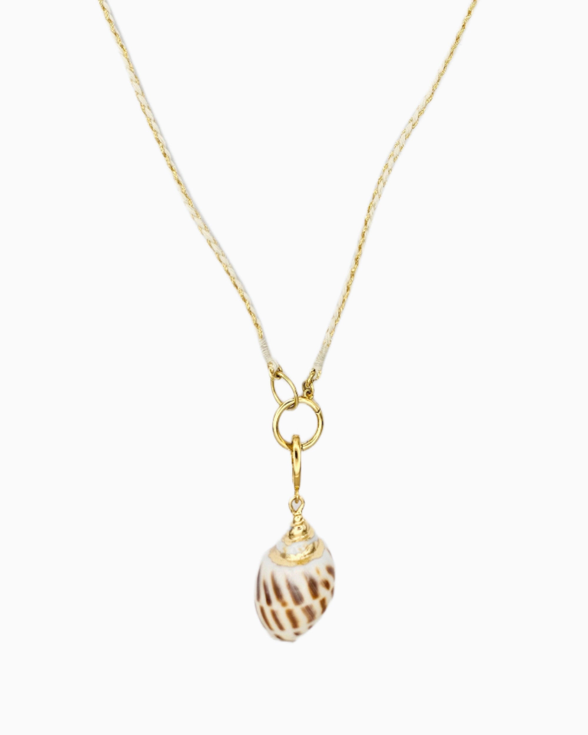Braided ivory and gold cord necklace featuring a detachable real shell pendant with gold trim.