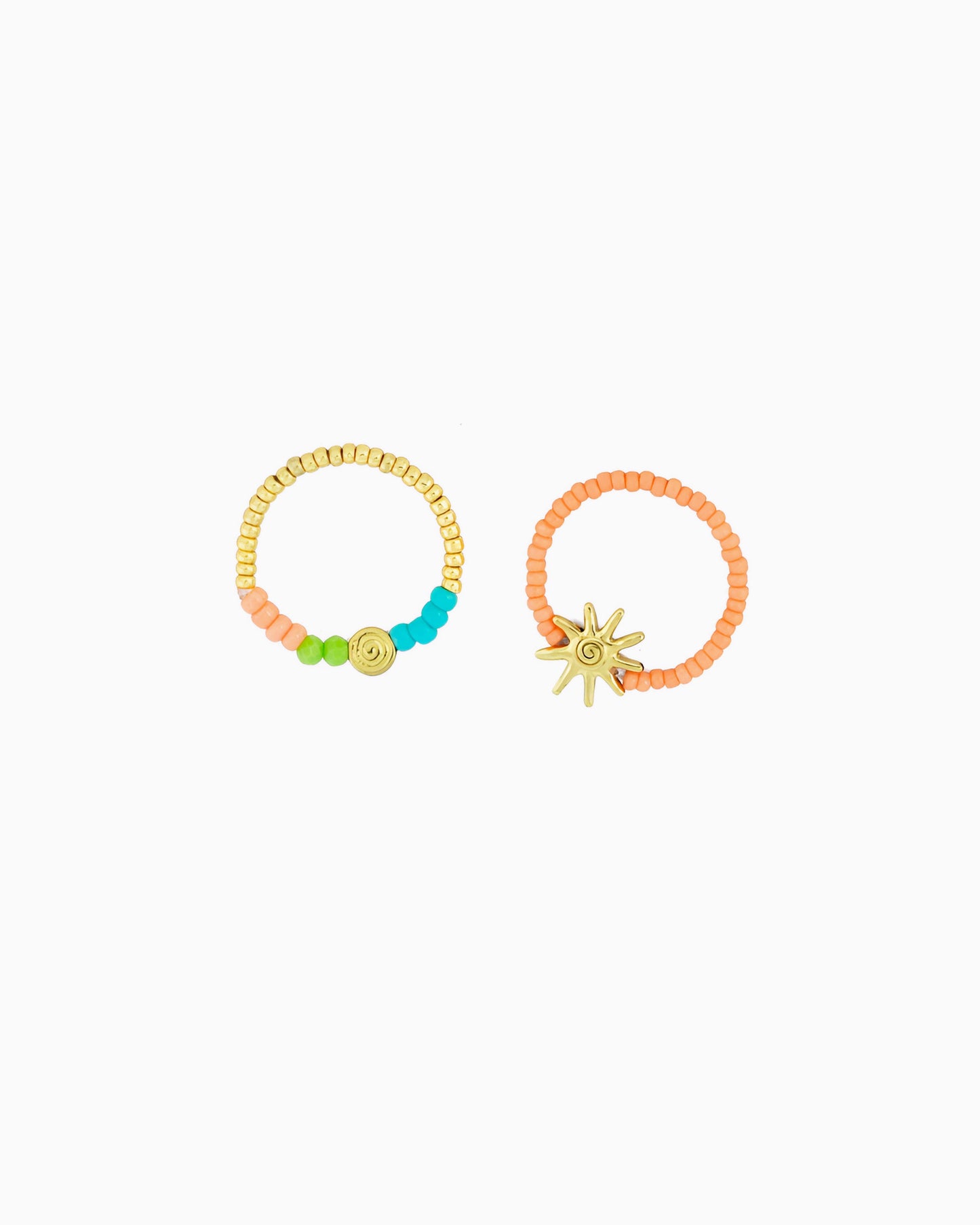 A playful ring featuring colorful beads, gold-tone accents, and sunray-inspired details. Inspired by sunny days by the sea, it adds a cheerful coastal touch to any jewelry stack.
