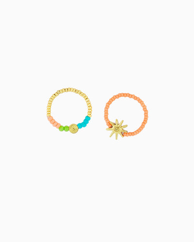 A playful ring featuring colorful beads, gold-tone accents, and sunray-inspired details. Inspired by sunny days by the sea, it adds a cheerful coastal touch to any jewelry stack.