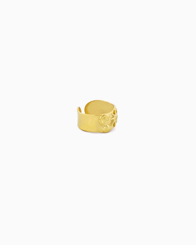 Shoreside Ring featuring sunray, nautilus shell, and seashell motifs on a polished wide-band adjustable ring