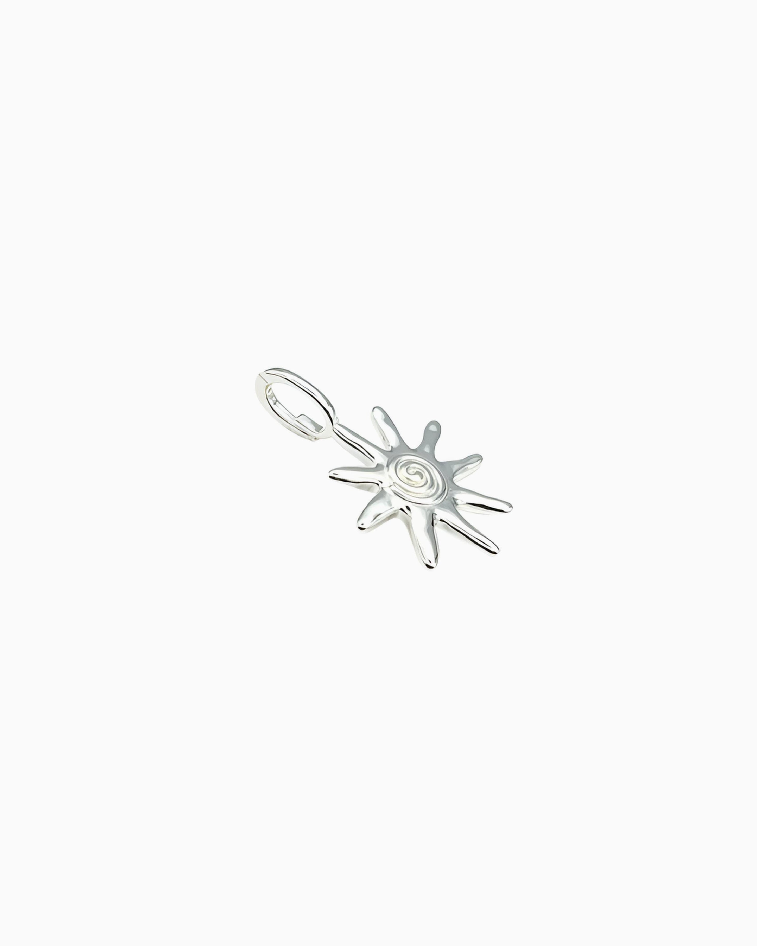 silver Sunray Clip-On Charm featuring a radiant sun-inspired design with textured ray details.