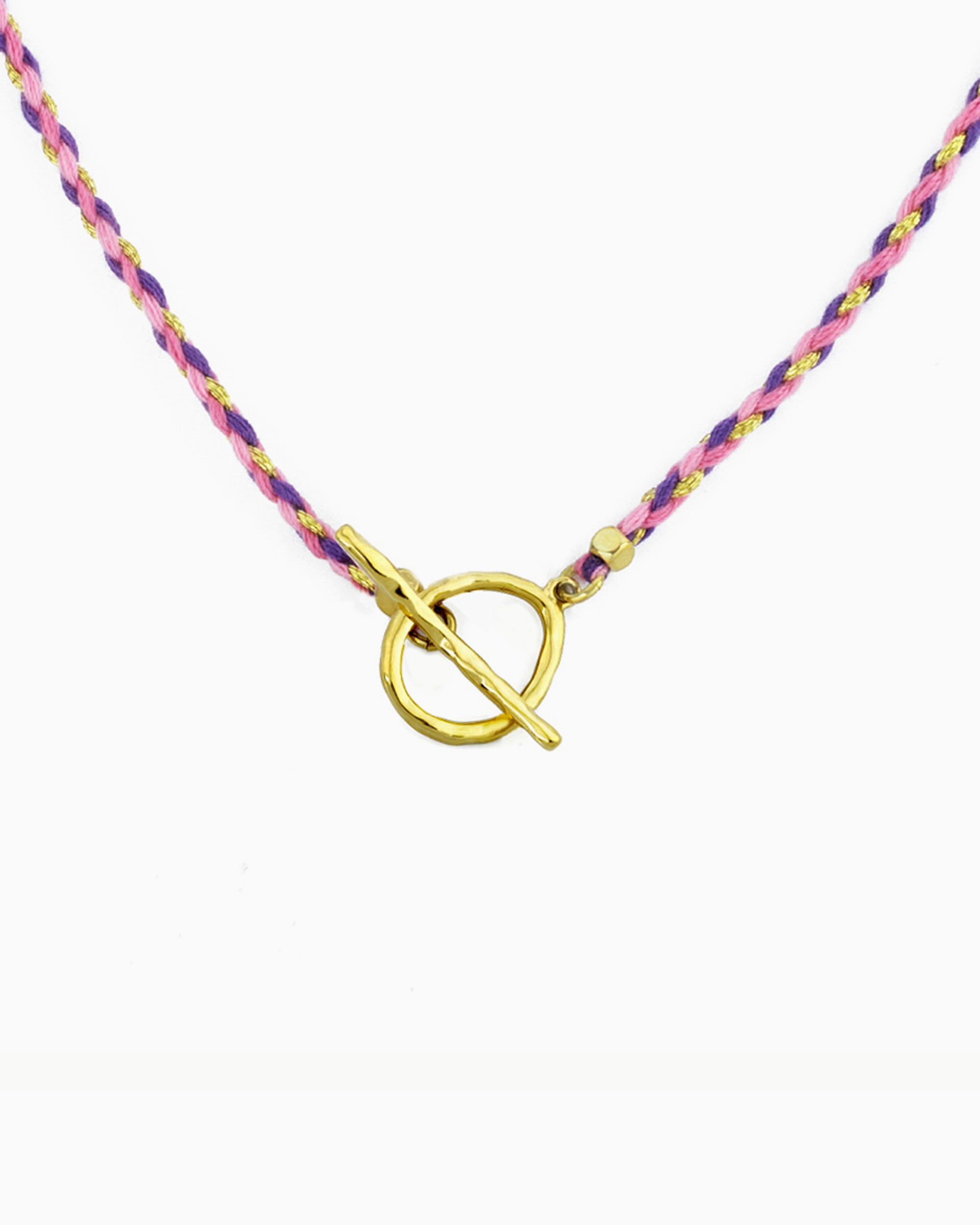 Hand-braided cord toggle necklace with an adjustable design for wearing as a choker or necklace, featuring a toggle ring for styling with ZoHaYo Clip-On Charms.