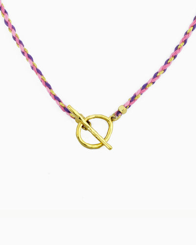 Hand-braided cord toggle necklace with an adjustable design for wearing as a choker or necklace, featuring a toggle ring for styling with ZoHaYo Clip-On Charms.