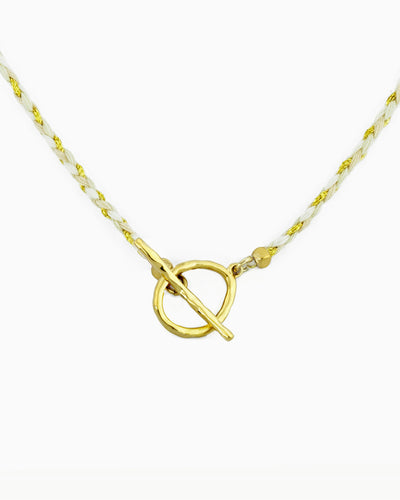 Hand-braided cord toggle necklace with an adjustable design for wearing as a choker or necklace, featuring a toggle ring for styling with ZoHaYo Clip-On Charms.
