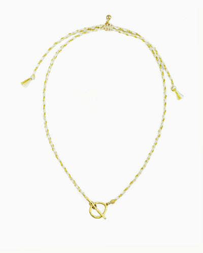 Hand-braided cord toggle necklace with an adjustable design for wearing as a choker or necklace, featuring a toggle ring for styling with ZoHaYo Clip-On Charms.