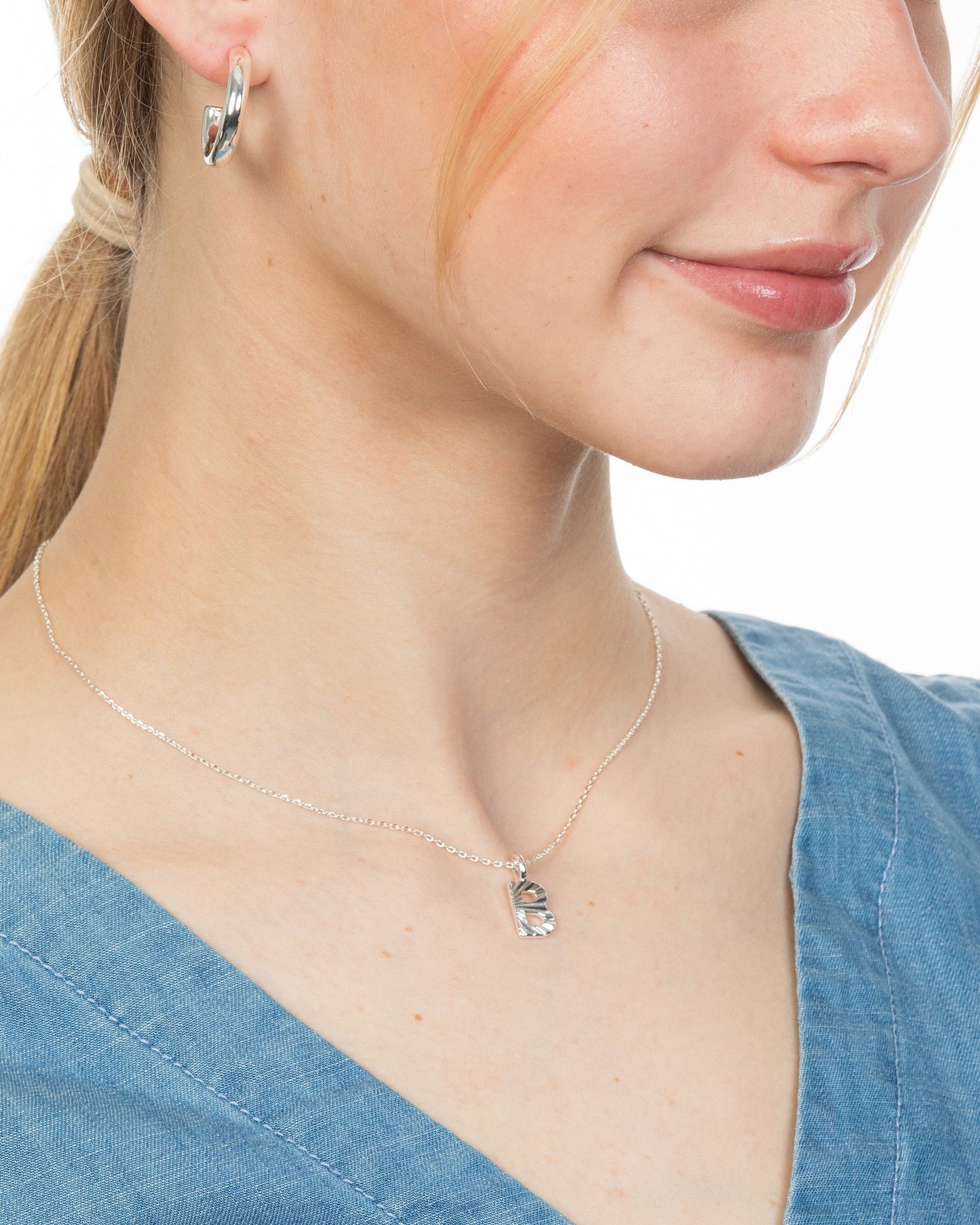 BUNBURST INITIAL PENDANT NECKLACE